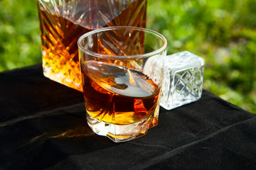 Carafe with a glass of whiskey