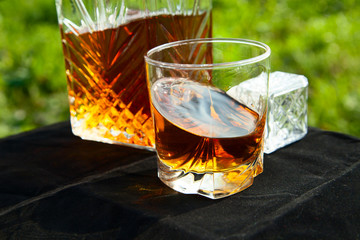 Carafe with a glass of whiskey