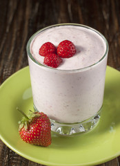 Strawberries with cottage cheese and yoghurt cream in a glass on
