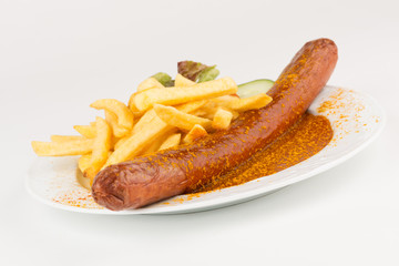 Riesencurrywurst mit Pommes