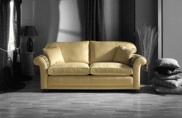 gold sofa in black and white room