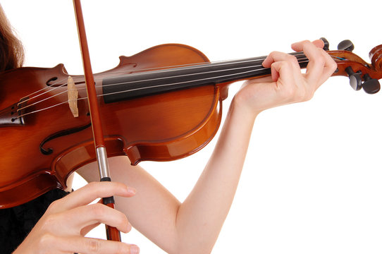 Closeup of violin playing.