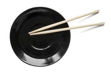 Fototapeta na wymiar Chopsticks on a plate