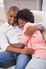 Fototapeta premium Happy couple relaxing on the couch