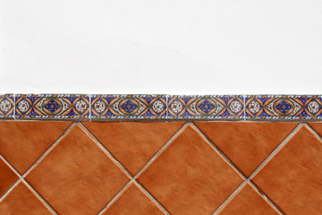 white wall and brown tiles background © chrupka
