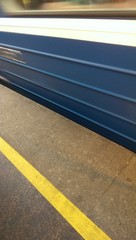 Blue train motion blur in St. Petersburg metropolitan