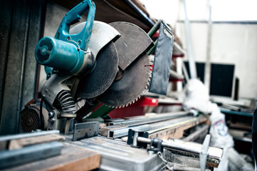industrial metal cutting tool in factory, mitre saw