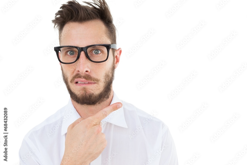 Aufkleber geeky young businessman looking at camera and pointing