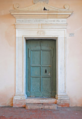 Fototapeta na wymiar Ravenna, Italy, old Saint Spirit Basilica door.