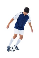 Football player kicking the ball