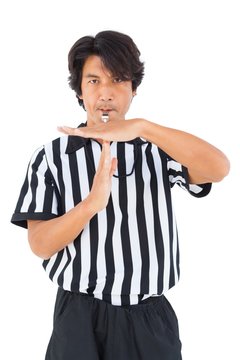 Stern Referee Showing Time Out Sign