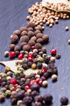 Assorted spices on a stone background 
