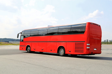 Red Coach Bus Departs on a Journey © Taina Sohlman