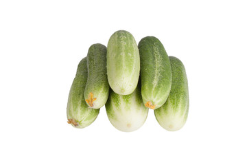 Few fresh cucumbers with flowers isolated on white background