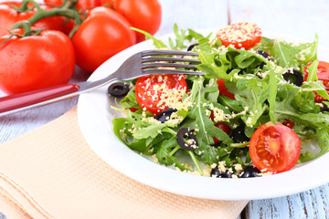 Fresh salad with arugula, close up