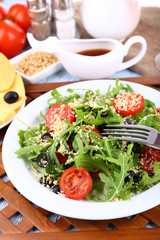 Fresh salad with arugula, close up