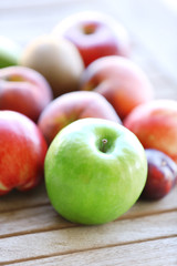 Juicy fruits on wooden table, close-up