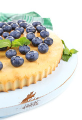 Tasty homemade pie with blueberries, isolated on white