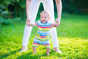 Baby talking his first steps