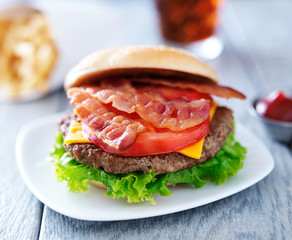 bacon chesseburger with fries and cola