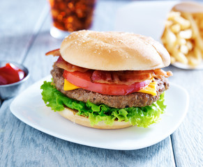 bacon cheeseburger meal with cola and fries