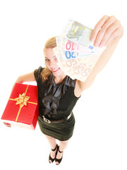 Woman with gift box and euro currency money banknotes.