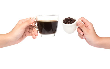 female hand hold cup of coffee beans isolated on white backgroun