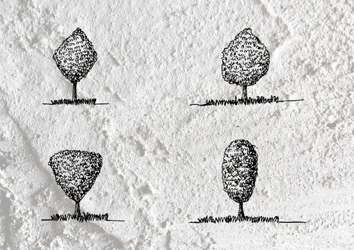 trees with leaves  in silhouettes  on wall texture background de