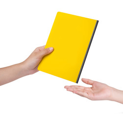 Female hand send a yellow book