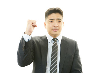 ガッツポーズのビジネスマン