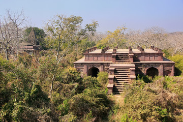 Fototapeta na wymiar Old building surrounded by trees, Ranthambore Fort, India