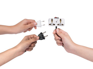 hand holding plug isolated on white background