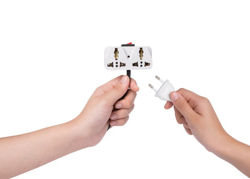 hand holding plug  isolated on white background