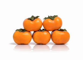 Ripe persimmon isolated on a white background