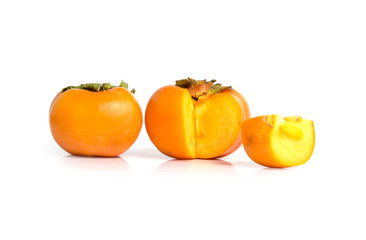 Ripe persimmon isolated on a white background