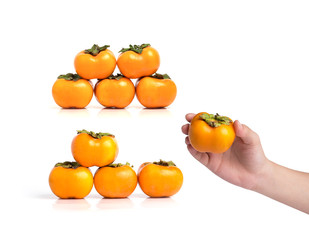 Groups of ripe persimmon isolated on a white background