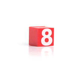 Colorful plastic numbers on a white background