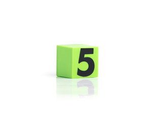 Colorful plastic numbers on a white background