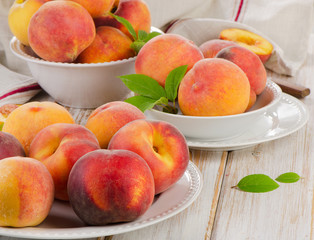 fresh peaches on a wooden table