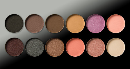 Make-up, colorful eye shadows palette on black