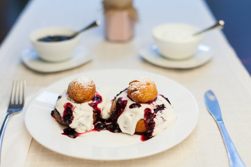Donuts with jam and cream