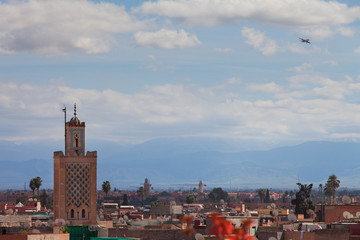 Historical walled city of Marrakesh with ariplane
