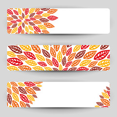 Three banners with autumn leaves.