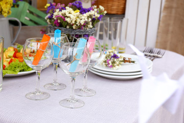 Buffet table with dishware waiting for guests