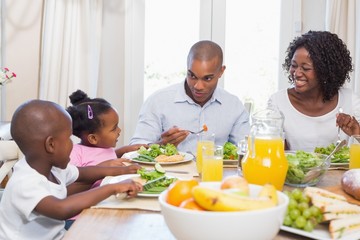 Happy family enjoying a healthy meal together