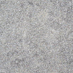Concrete wall covered with pebbles