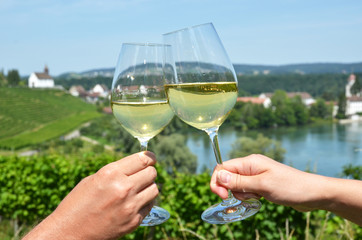 Pair of wineglasses against vineyards in Rheinau, Switzerland