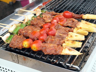 roasted pork on grill