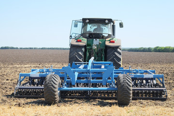 Obraz premium tractor with a plow