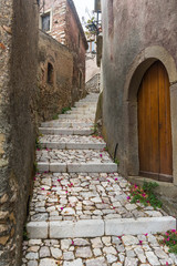 Narrow street of old town Forsa d'Agro. Sicily, Italy